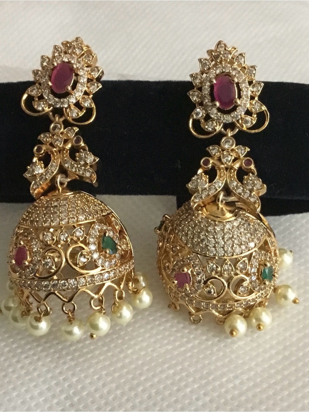 Gold-tone Pearl Drop Jhumka Earrings with Pink and Green Stones
